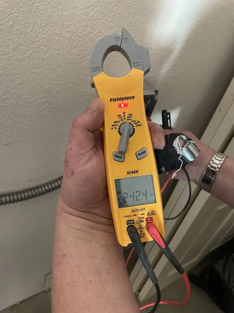 Voltage testing with clamp meter during Ceiling Fan Installation in Humboldt
